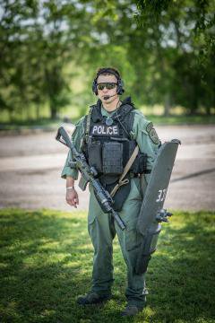 Not your friendly neighbourhood officer--a SWAT team member. 