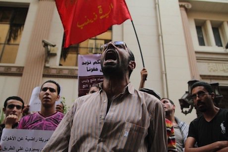 An anti-IMF protester in Cairo. Demotix/Mohamed Ali Eddin. All rights reserved.