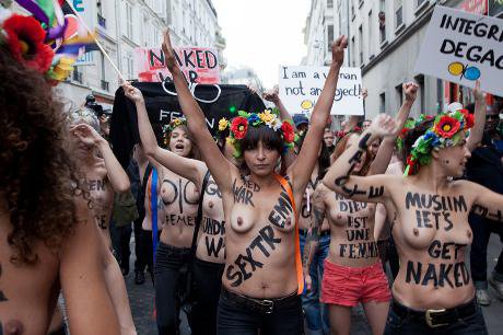 FEMEN activists celebrate their new headquarters in Paris
