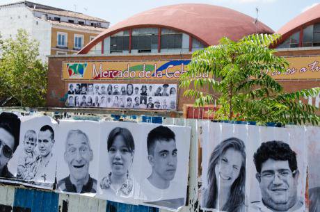 Wall of Cebada market covered with &#39;Be the change&#39; portraits, September 2012.