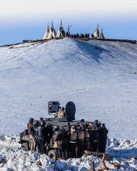 Protesters and the National Guard, Standing Rock, February 2017. Ryan Vizzions/Standing Rock Rising. All rights reserved.