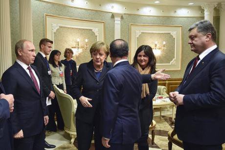 Putin, Merkel, Hollande and Poroschenko at the Minsk Summit 2015. flickr/Poggemann. Some rights reserved