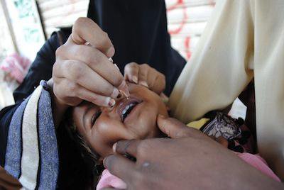 A child receives the polio vaccine