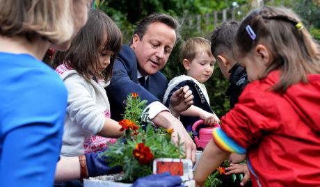 Prime Minister David Cameron visiting a nursery.
