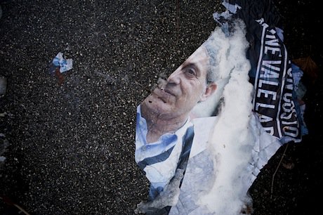 What remains of an electoral poster on the streets of Bologna. Demotix/Michele Lapini. All rights reserved.