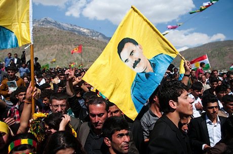 PKK supporters hold pictures of imprisoned leader Abdullah Öcalan during a celebration of the Kurdish New Year. Demotix/Pazhar Mohammad. All rights reserved.