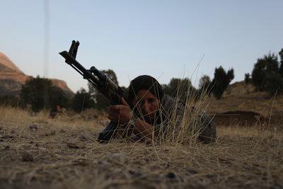 Female PKK soldier near the Turkish border. Demotix/Eddie Gerald. All rights reserved.