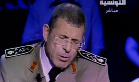 Tunisian General Rachid Ammar announces his resignation on TV, June, 2013.