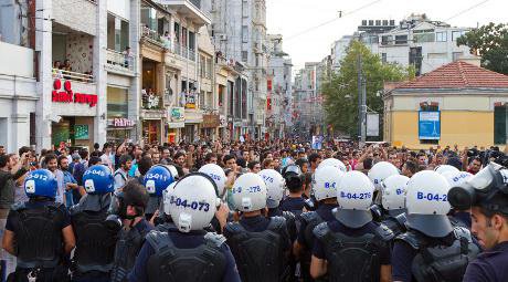 Protesters gathered in Taksim Square are intercepted by riot police.
