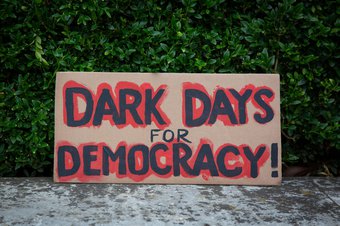 Dark Days for democracy protest placard UK