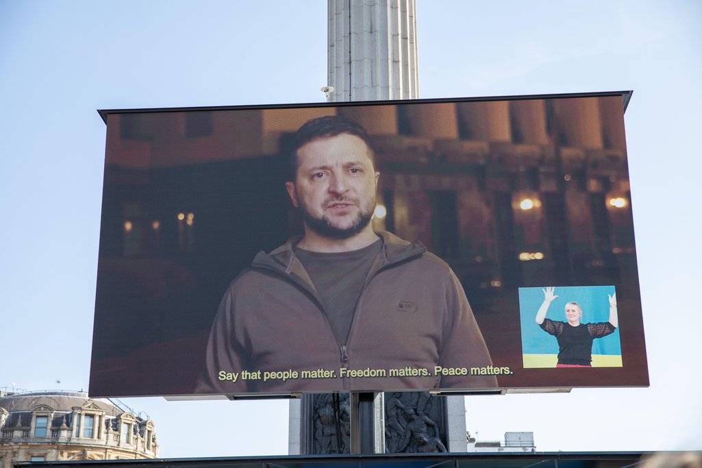 Ukrainian president Volodymyr Zelenskyi on a screen at a solidarity rally in Trafalgar Square, 26 March 2022