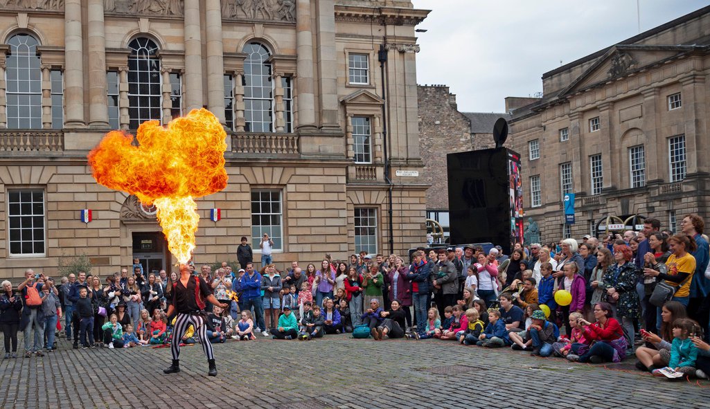 Nathan Manchutta blows a fire ball
