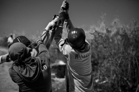 Electric company workers repair a power line on Bantayan Island, Philippines. Demotix/Andrew Collins. All rights reserved.