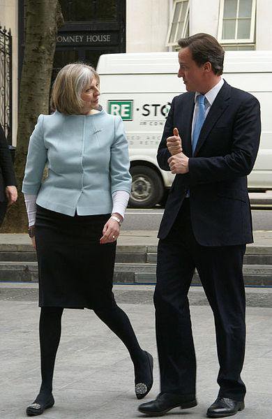 Prime Minister David Cameron is met by Theresa May on his first visit to the Home Office