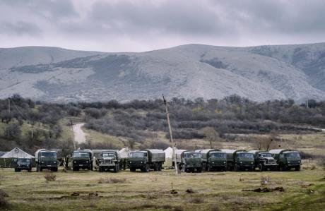 A line of Russian trucks preparing to move in Crimea.