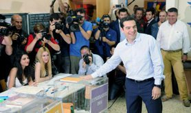 Syriza party leader Alexis Tsipras votes in 2014 European elections.