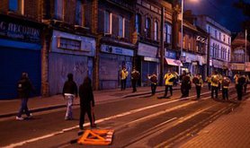 Standoff between police and rioters, Croydon, London, 2011. 