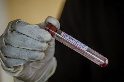 Blood tests at the government hospital in Kenema, Sierra Leone. Demotix/Tommy Trenchard. All rights reserved.