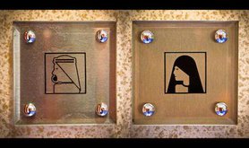 Bathroom signs in Burj Al-Arab. Flickr/Asim Bharwani. Some rights reserved.