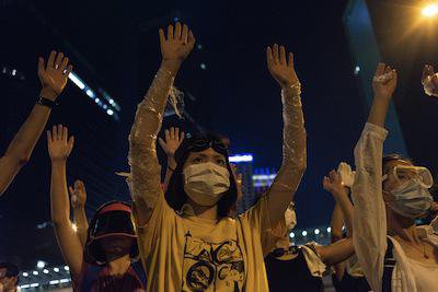 Occupy protesters prepare for tear gas, Hong Kong. Demotix/Robert Godden. All rights reserved.
