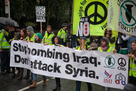 Anti-war campaigners call for an end to bombing Iraq, 2014.