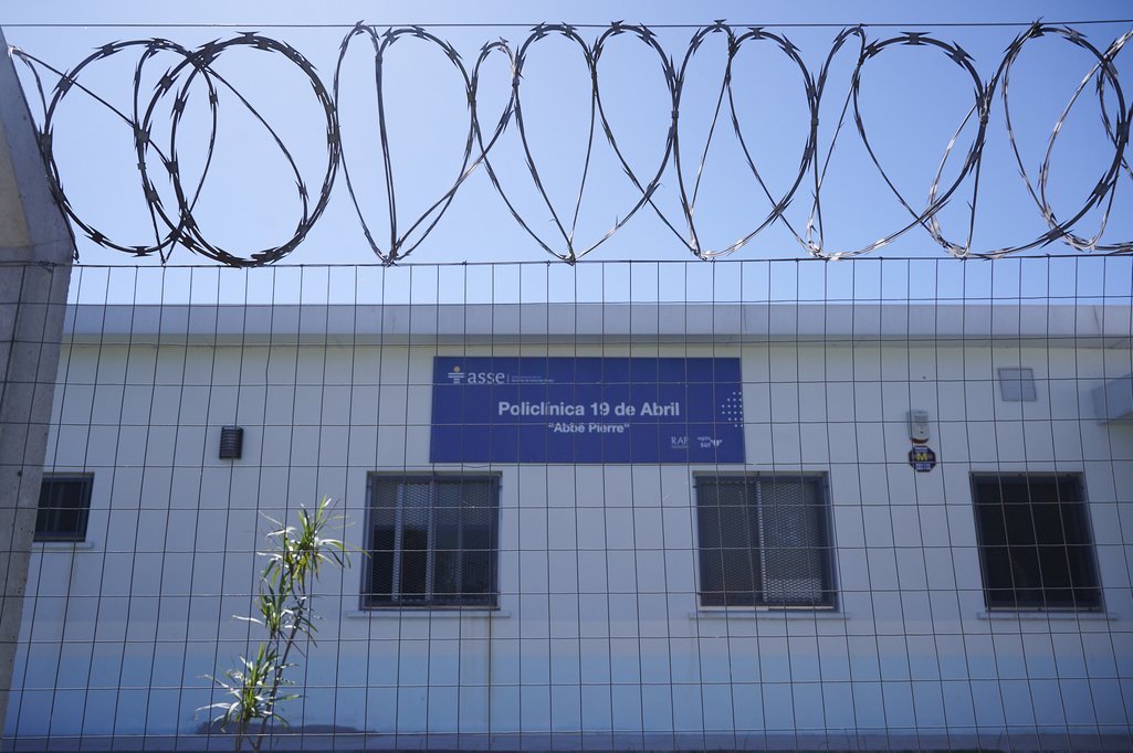 The public healthcare clinic in the 19 de Abril neighbourhood, Montevideo, with wire fencing and barbed wire
