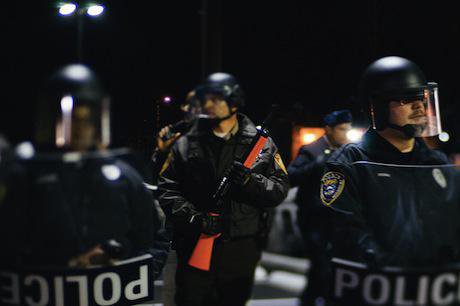 Police outside Ferguson Police Department, November 2014. Demotix/Bryan Sutter. All rights reserved.
