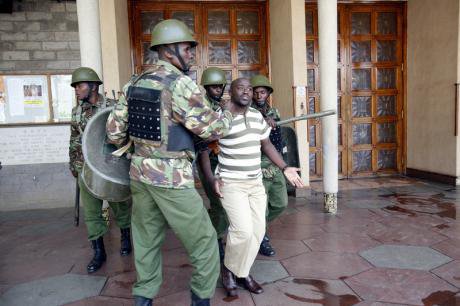 Protesters confront police over Terror Law passed by Kenyan Parliament, Dec. 2014