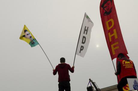 Alevi protestor at compulsory religious classes with PKK and HDP flags, 2015. 