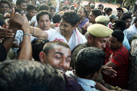 Indian crowd celebrate newly elected politicians in Nagaon, 2013.
