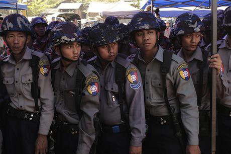 Myanmar police stage crackdown. Thet Htoo/Demotix. All rights reserved.