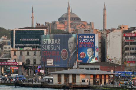 A billboard of the AKP, with a portrait of prime minister Erdogan on Istanbul&#39;s waterfront, with the Aya Sofia mosque.