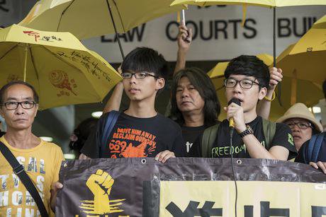 Joshua Wong appears in court. Demotix/Jayne Russell. All rights reserved.