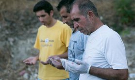 Men bury casualty of refugee crisis on Lesbos (Demotix/John Rudoff)