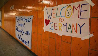 Volunteers prepare to welcome 1,000 refugees at Dortmund station. (Felix Huesmann/Demotix)