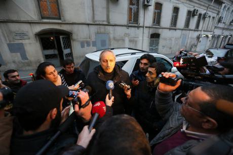 Lawyer Fuad Aghayev talks to the press after the sentencing of his client, journalist Rauf Mirkadyrov, to 6 years&#39; imprisonment 