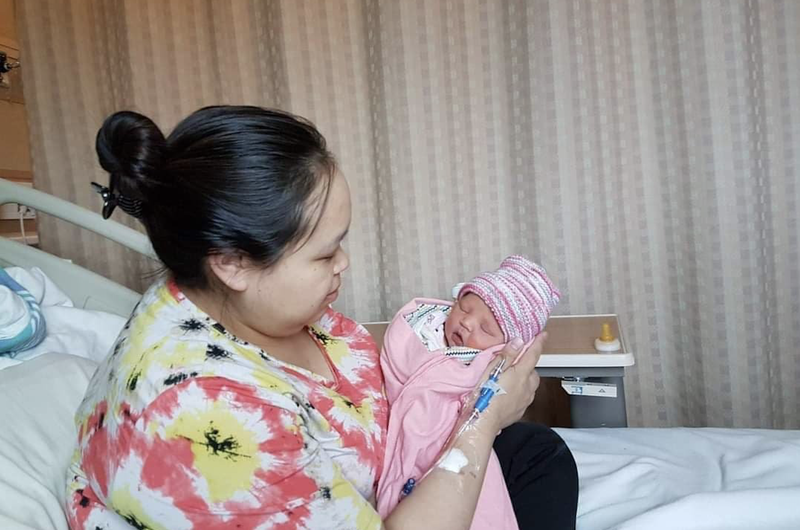 Alookie Otuk with her newborn daughter.