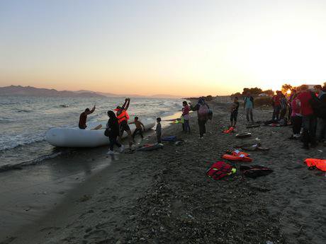 A boat carrying refugees arrives in Kos, Greece. Christopher Jahn:IFRC:Flickr. Some rights reserved.jpg