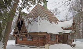 A wooden Russian teremok in winter. 
