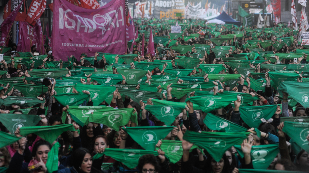 Abortion rights activists raise green scarves in Buenos Aires, Argentina, 2019