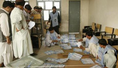  IEC officials in the southern province of Kandahar count the ballots of voters