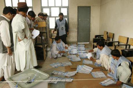  IEC officials in the southern province of Kandahar count the ballots of voters
