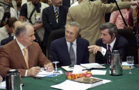 Ahmed Chalabi of Iraq with Donald Rumsfeld and Paul Bremer, 2008. 