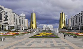 Nursultan Nazarbayev's presidential palace, a shining modernist building surrounded by gold plated towers. 