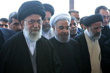 Ali_Khamenei_and_Hassan_Rouhani_in_funeral_of_Abbas_Vaez-Tabasi.jpeg
