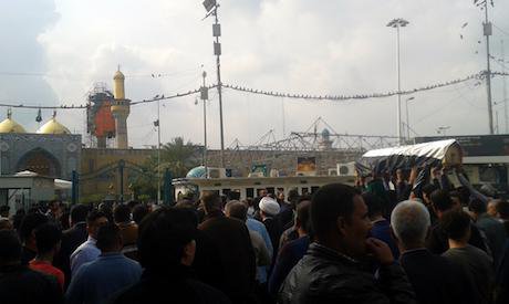 A martyr of the war against Daesh is carried to the Kathimiyya shrine in Baghdad. Ali Ali. All rights reserved.