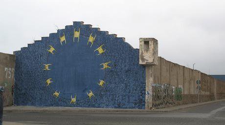 Graffiti by the artist BLU in Morocco, close to the border with Melilla.