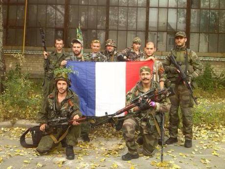 French volunteers in Donbass. Nikola Petrovic stands front row right He has a mustache and an assault rifle.