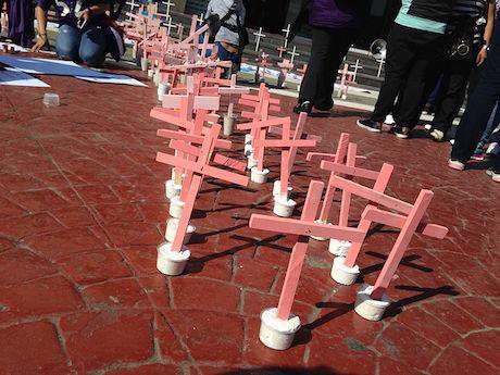 Red crosses displayed in protest against feminicide in Mexico. Used with permission