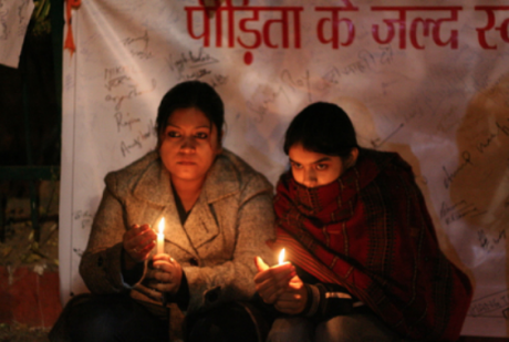 Candlelit vigil for a child victim of a gang rape, Delhi, India 2012.